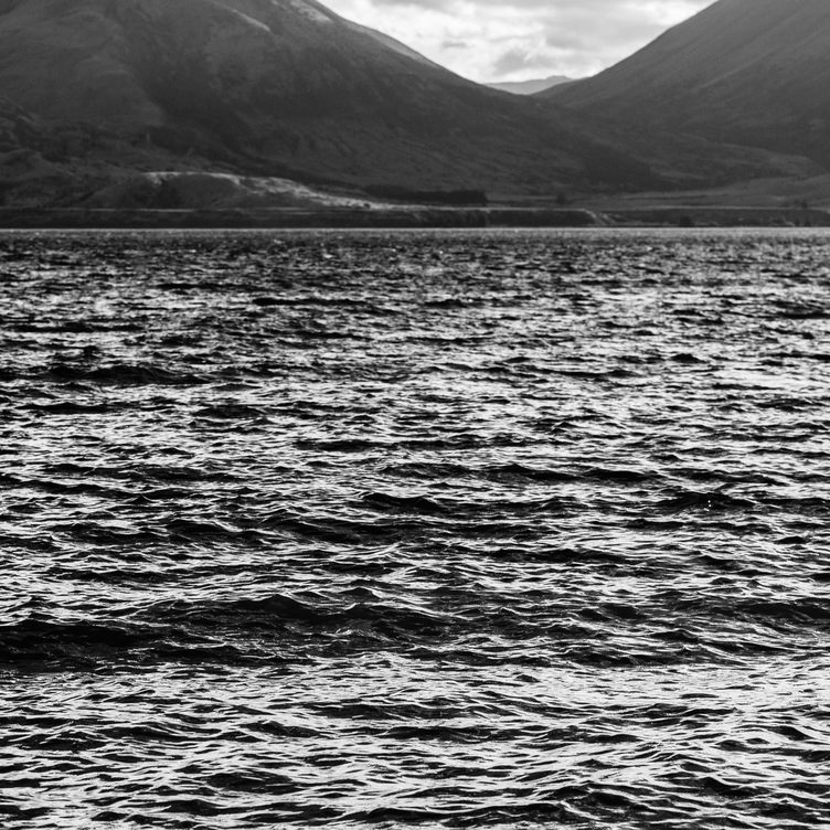 The high-contrast waves of Lake Wakatipu.